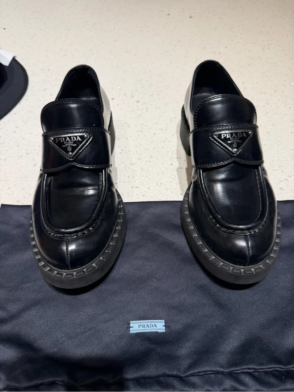 Prada Black Leather Penny Loafers with Logo Plaque